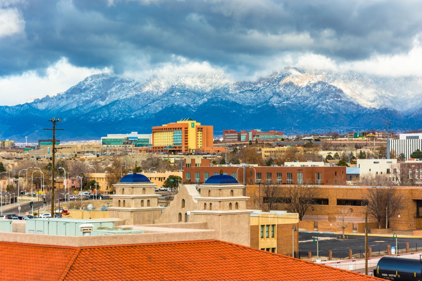 View of distant mountains and buildings in Albuquerque, New Mexico.